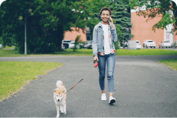 Woman walking her dog