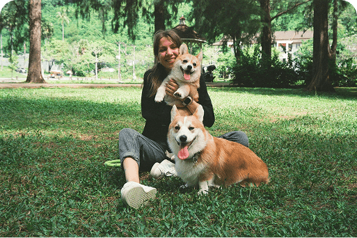 A woman with her two dogs