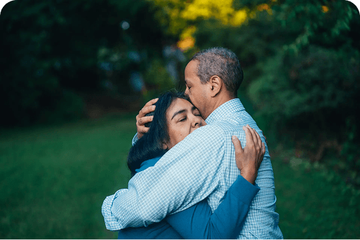 A couple hugging each other